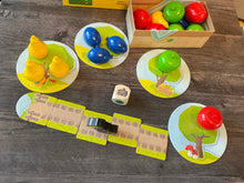 Load image into Gallery viewer, Top down view of the board. The die with the braille on it can be seen