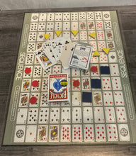 Load image into Gallery viewer, shot of the sequence board with the replacement braille cards. Shaped foam tokens replace the poker chips.