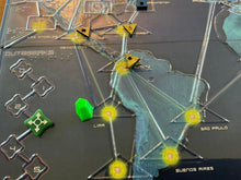 Load image into Gallery viewer, Close up on South America.. Triangle wooden pieces replace the yellow cubes. A replacement player token is also shown.