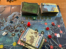 Load image into Gallery viewer, A shot of the infection deck and the transparent braille on the cards.