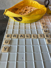 Load image into Gallery viewer, A picture of the tiles in the tray with the words "buy braille games" spelled out.