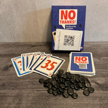 Load image into Gallery viewer, Shot of the No Thanks Box, cards with the transparent braille stickers on them and the QR codes for flavor text