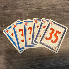 Load image into Gallery viewer, Close up shot of the numbers with the transparent braille stickers on them.