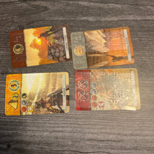 Load image into Gallery viewer, Close up on the different age cards. These are shown landscape as the braille is put on these cards sideways in order to fit all the needed information.