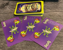 Load image into Gallery viewer, Product cards for secret, table and spring. All have transparent braille on them