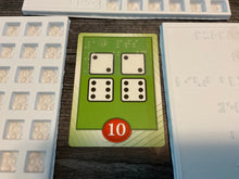 Load image into Gallery viewer, A close up on a point card that needs 2 2 dice, and 2 6 dice. It is worth 10 points