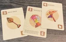 Load image into Gallery viewer, 3 of the play cards, "grave maker, bone head and delicious smoothie." All the cards have their value and function on them in braille