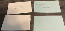 Load image into Gallery viewer, An example response card "old people" and an example prompt card "Our day at the water park was totally ruined by _". Two other cards are shown the back side of them, they have response and prompt written on them in braille. All cards are printed in large print with interpoint.