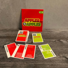 Load image into Gallery viewer, Some apples to apples cards. The transparent braille can be seen. The cards have a QR code on them for the full text.