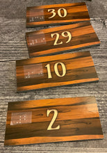 Load image into Gallery viewer, The back of the domino tiles. a number can be seen on each one showing it's rank