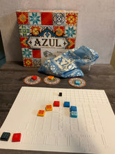 Load image into Gallery viewer, A shot of the Azul box with one of the thermoformed replacement boards with tiles on it. Each tile has a transparent braille sticker on them.