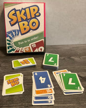 Load image into Gallery viewer, A shot showing the cards laid out. Every card has transparent braille on them.