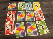 Load image into Gallery viewer, Another shot of the 3x4 grid. The game is played with each player having this setup and flipping cards