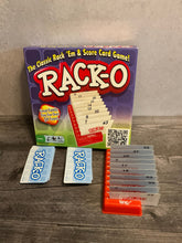 Load image into Gallery viewer, The game, with one rack setup with braille on it.
