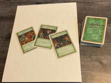 Load image into Gallery viewer, The reference sheet for the Gerki deck, along with the cards from the deck.