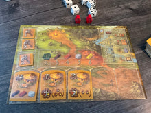 Load image into Gallery viewer, A picture of the player board with transparent braille overlay.