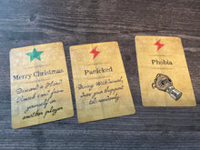 Load image into Gallery viewer, Christmas card and panicked and phobia hard knock cards with transparent braille