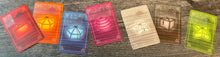 Load image into Gallery viewer, The different lantern cards. All have transparent braille on them