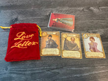 Load image into Gallery viewer, The love letter cards laid out. All of the cards have transparent braille on them