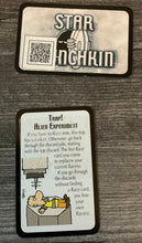 Load image into Gallery viewer, An example door card. The card's name is on the front in transparent braille and the full text of the card is available with the QR code on the back