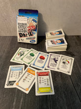 Load image into Gallery viewer, Monopoly Deal game with braille on it. All the types of cards are shown.