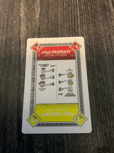 Load image into Gallery viewer, Image of a red/yellow wild property card
