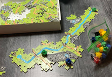 Load image into Gallery viewer, An overhead shot showing the box, the game and the pieces.