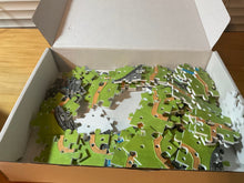 Load image into Gallery viewer, A shot of the box showing all of the tiles included in the game