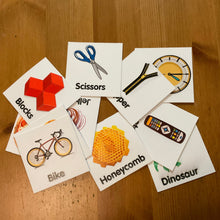 Load image into Gallery viewer, Wide shot showing a collection of different cards such as blocks and honeycomb.