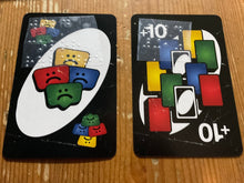 Load image into Gallery viewer, Close up on 2 of the cards with braille on them.