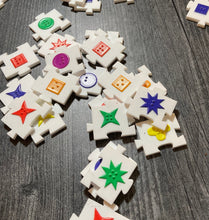 Load image into Gallery viewer, Shot of the colorful acrylic pieces scattered on the table.