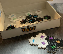 Load image into Gallery viewer, Shot of the braille/print box and the acrylic pieces.
