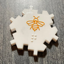 Load image into Gallery viewer, Close up of the queen b. The bee is tactile and has a q on it in braille.