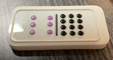Load image into Gallery viewer, Close up on a domino. It shows the raised edges so that the pieces do not 'tip' even if they have fewer pips on them.