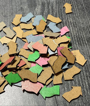 Load image into Gallery viewer, A close up on the arrow shaped pass tokens. These are actually smaller than the ones that will be in the final product.