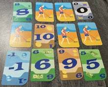 Load image into Gallery viewer, A 3x4 field of cards with some of them face up and some of them face down.