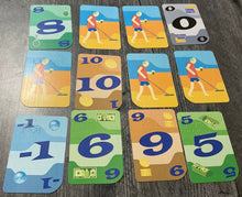 Load image into Gallery viewer, A 3x4 field of cards with some of them face up and some of them face down.