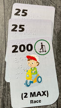 Load image into Gallery viewer, A close up of a stack of Race cards. A scooter card can be seen  on the top of the stack.