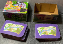 Load image into Gallery viewer, A shot of the prototype 1000 Yards box and the cards.