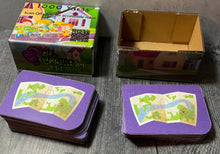 Load image into Gallery viewer, A shot of the prototype 1000 Yards box and the cards.