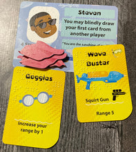 Load image into Gallery viewer, Close up on the Steven attendee card with towels on it and some tools.