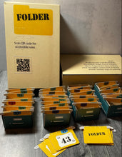Load image into Gallery viewer, A picture of the Folder box with the different cardboard filing cabinets in front. Each one has a bunch of folder shaped cards in it.