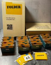 Load image into Gallery viewer, A picture of the Folder box with the different cardboard filing cabinets in front. Each one has a bunch of folder shaped cards in it.