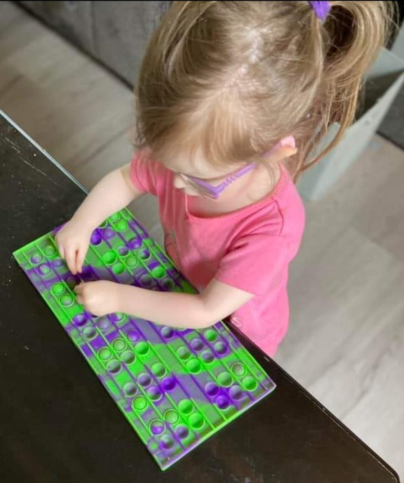 64 Oz. Braille Pop It – 64 Ounce Games