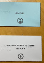Load image into Gallery viewer, An example character card(angel) and example attribute card (entire body is very sticky) Both cards have large print and Braille on them