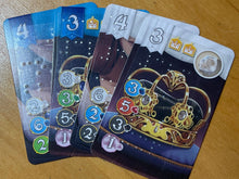 Load image into Gallery viewer, Close up on gem cards with transparent braille on them