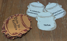 Load image into Gallery viewer, A close up on the pot cards. They are cut in the shape of pots and have words and concepts on them that might fit with the kettle card. The cards have both print and braille on them.