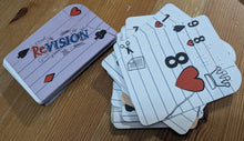 Load image into Gallery viewer, A deck of playing cards styled like lined notebook pages with black ink markings and red heart details. Each card has both large print, icons and braille on them.