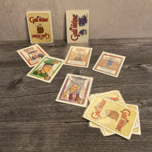 Load image into Gallery viewer, Guillotine cards face up and face down. face up cards have braille stickers on them.
