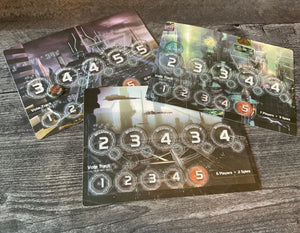 The player boards with tactile overlays on them